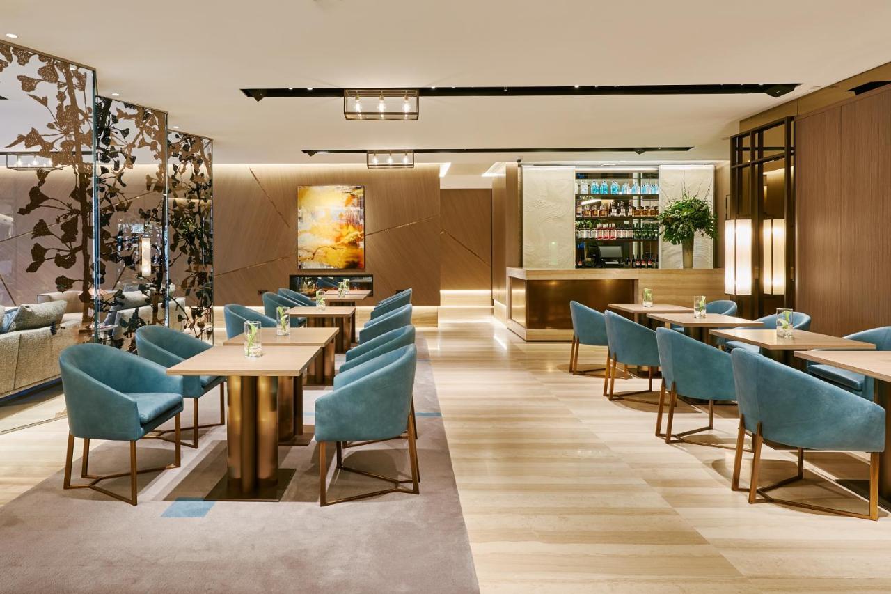 Vp Plaza Espana Design Madrid Esterno foto The Wing at Hong Kong International Airport